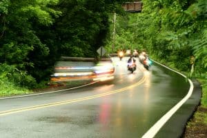 The Fastest Way to Stop a Motorcycle in a Curve