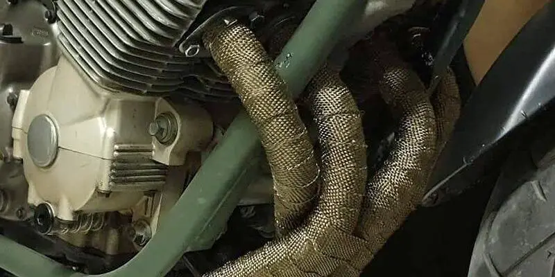 motorcycle pipes that have been wrapped 