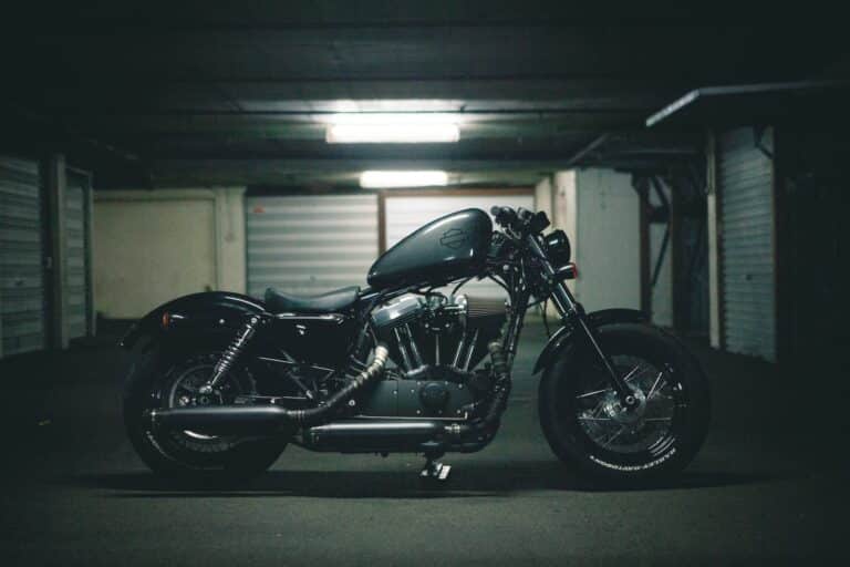 black bobber motorcycle inside garage