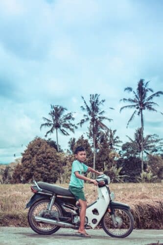 Unprotected Underage boy Riding Motorcycle